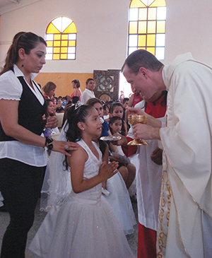 Vision 2016 Herman 3 Starting the week off right Herman at a 1st Communion