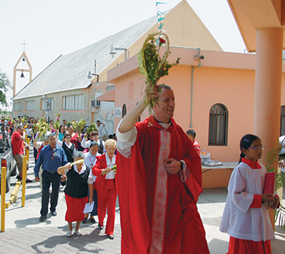 Vision 2016 Herman 4 Starting the week off right Herman leads a Palm Sunday procession