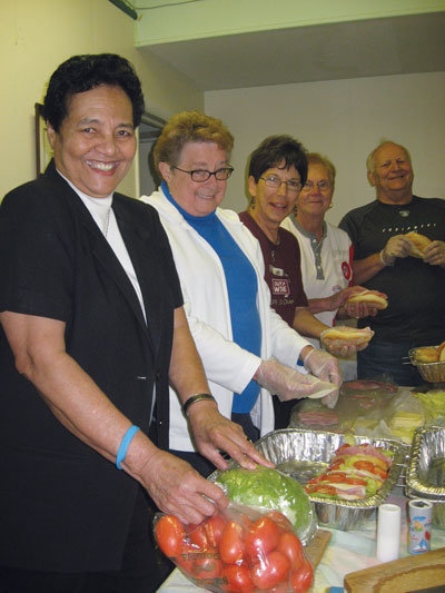 Vision 2016 Oatis 5 Feeding the poor enriches the lives of sisters Muus and volunteers prepare hoagies