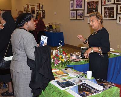 Vision 2016 Scheiber 7 Josephites have a dream Cheryl Holley, director of the Josephite Pastoral Center in Washington, D.C., staffs a display table of resources specifically developed for the African-American community