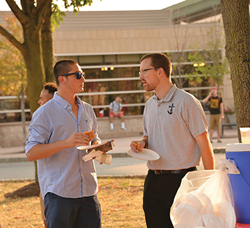 Vision 2017 Schlumpf 7 Brotherly advice At “Pizza on the Plaza,” a campus ministry event at Rutgers State University, Jordan chats with a student.