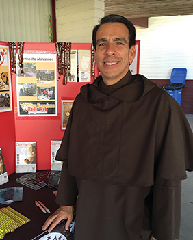 Vision 2017 Scanlon 4 Persistent call pays off Henson takes part in a vocation fair as part of his ministry.