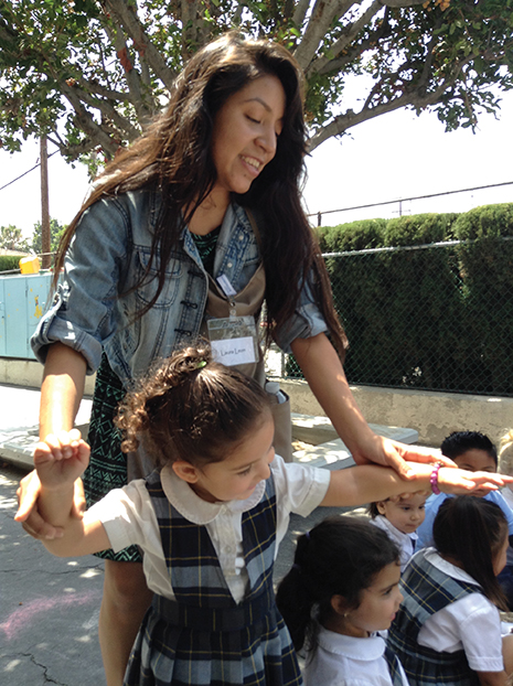 Vision 2017 O'Connell-Cahill 3 Pope Francis wants YOU to be a missionary Laura Leon plays with children at Little Flower Educational Center in Los Angeles,