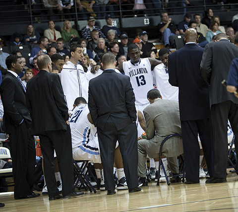Vision 2018 Scanlon 3 Team spirit: The priest on Villanova’s bench Hagan (second from left) at a Villanova basketball game.