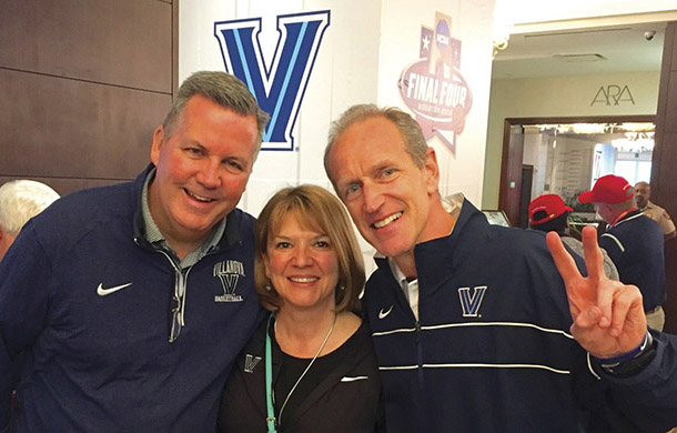 Vision 2018 Scanlon 6 Team spirit: The priest on Villanova’s bench Hagan (right) is with Steve Murphy of the Villanova University Alumni Association board and Nancy Lane, incoming president of the Villanova University Alumni Association.