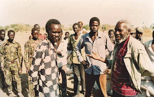 Vision 2018 Bragotti 3 Five reasons I love being a missionary priest Father Joseph Bragotti, M.C.C.J. snapped this photo during a tense encounter between Sudanese civilians and rebel soldiers in 1994. Bishop Paride Taban of Torit, Sudan is on the far right.