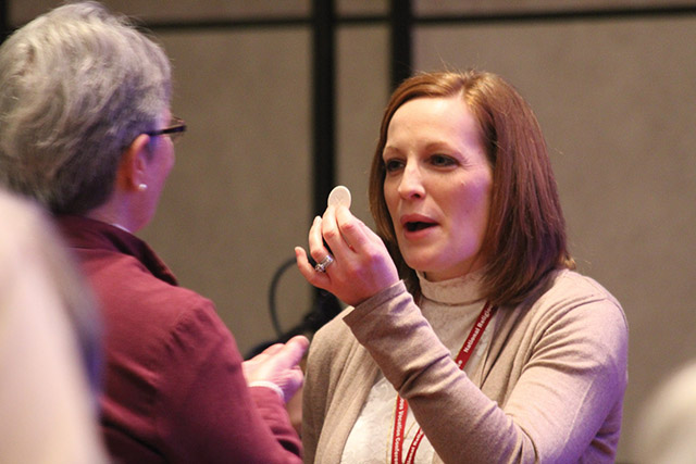 Vision 2019 Boudreau 6 What Catholics believe about Jesus Handing out the Eucharist