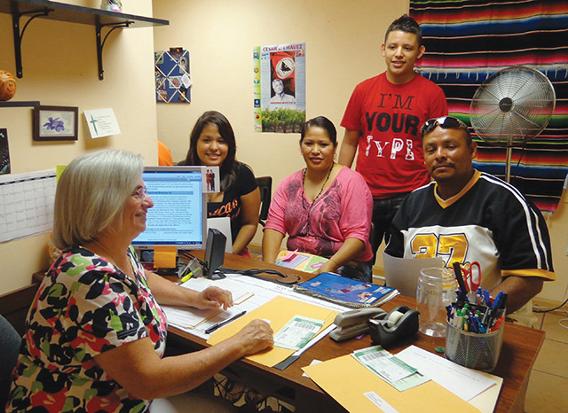 Vision 2020 Schuck Scheiber 4 Rural religious take to the highways and byways Sister Alicia Zapata, R.S.M. talks with migrant workers in Central Florida.