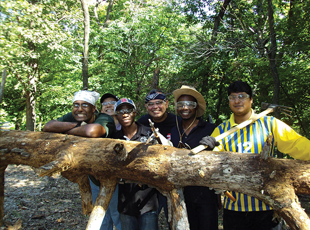 Vision 2020 Schuck Scheiber 6 Rural religious take to the highways and byways Novices with the Missionary Oblates (O.M.I.) remove the invasive species of honeysuckle from Missionary Oblates’ Woods, a nature preserve in Godfrey, Illinois.