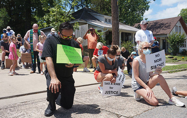 Vision 2021 Camille 2 What the church is teaching—and learning—about the sin of racism Father Rubén Quinteros of the Diocese of Little Rock, Arkansas is among Catholics and members of other churches who “took a knee” at a June 2020 Little Rock rally