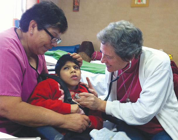 Vision 2021 Gildea 4 Call within a call: Your vocation and a career Gildea (right) provides medical care to a child with special needs at the clinic she founded in Anapra, Mexico.