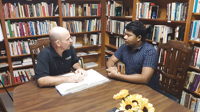 Vision 2021 Gildea 2 Call within a call: Your vocation and a career Brother John Skrodinsky, S.T. (left) is pictured here talking about his legal work with one of the men in formation with his community.