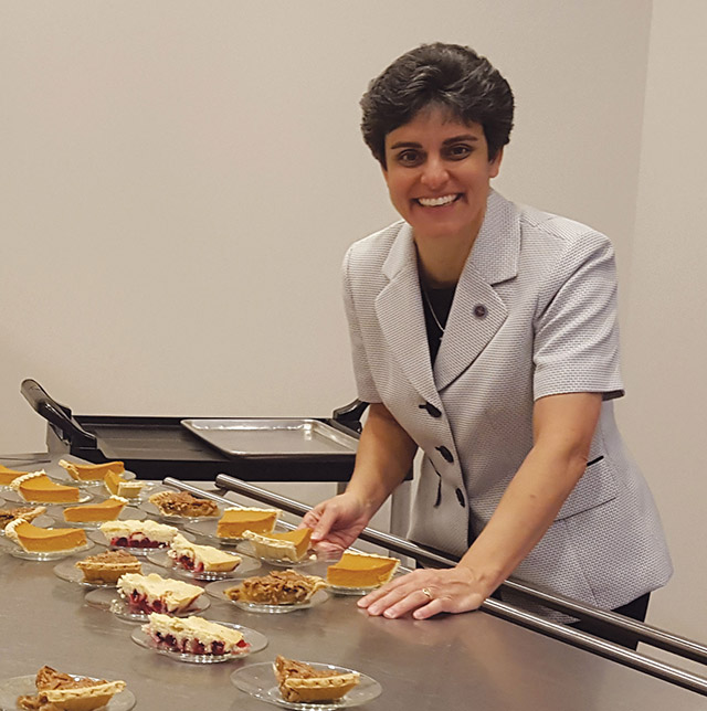 Vision 2021 Cutaia 5 Benedictines believe in balance Sister Tonette Sperando, O.S.B. helps serve pie.