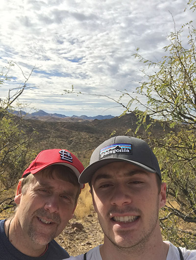 Vision 2021 Flansburg 3 Religious orders aid and advocate Father Corey Brost, C.S.V. (left) with a student pilgrim near the U.S.-Mexico border