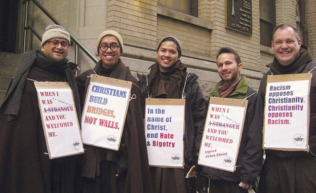 Vision 2021 Flansburg 6 Religious orders aid and advocate Father Julian Jagudilla, O.F.M. (far left) advocates for immigrant rights with members of his religious community.