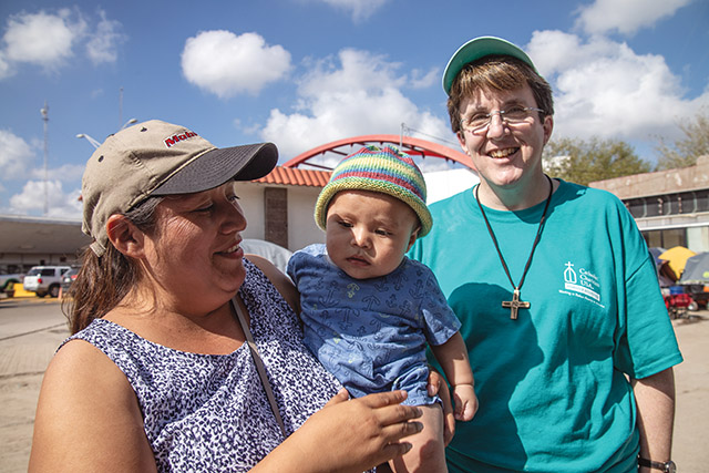 Vision 2022 Editors 3 17 questions about church vocations Many sisters do not wear a habit but do wear a religious symbol, such as the cross worn here by Sister Jennifer Pierce, SNDdeN (right).