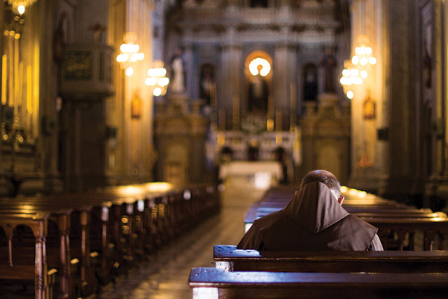 Vision 2022 Editors 2 17 questions about church vocations Brother praying in a church