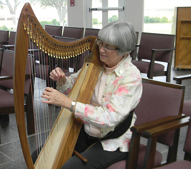 Vision 2022 Hingle/Kaufmann 5 FAQs about midlife callings Sister Theresa Hoffman, O.S.B. plays the harp.
