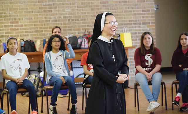 Vision 2022 Scheiber 6 Respite and renewal brought to you by religious communities Sister Emmanuela Le, C.S.F.N. leads a retreat at Nazareth Retreat Center for young women reflecting on their vocation.