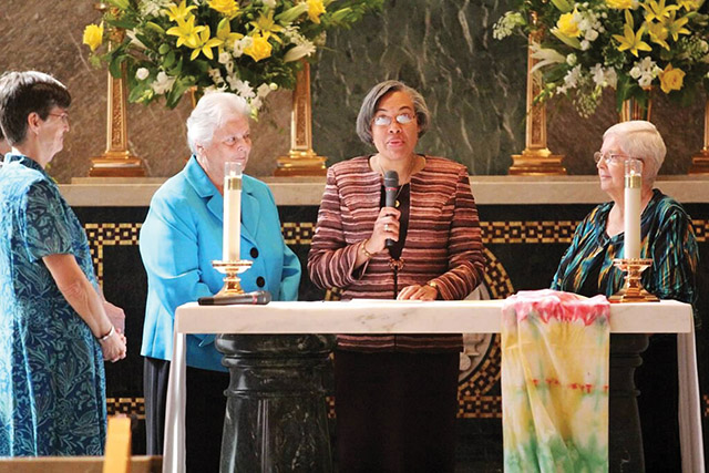 Vision 2022 Hingle/Kaufmann 3 FAQs about midlife callings Sister Jackie Nedd, R.S.M. is pictured here at the microphone taking her final vows with (from left) Sisters Marguerite Pessagno, R.S.M., her vocation minister; Mid-Atlantic president Patricia Vetrano, R.S.M.; and Institute president Patricia McDermott, R.S.M.
