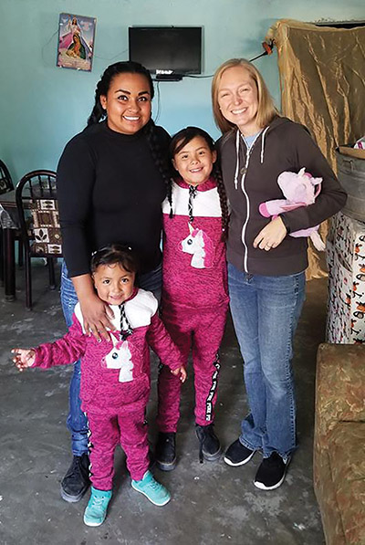 Vision 2023 Kemme 2 My millennial response to a perennial call Sister Tracy Kemme, S.C. visiting a family she met while ministering at the U.S.-Mexico border from 2010-2013.