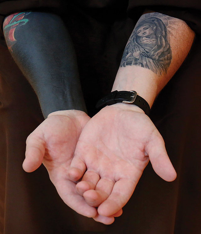 Vision 2023 Duriga 2 A priest (who’s been there) responds to the pain of addiction Father M.J. Groark, O.F.M.Cap. shows his tattooed arms