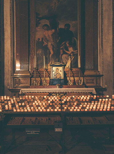 Vision 2023 Camille 2 Prayer: Our never-ending conversation with God Catholic church altar with many lit candles