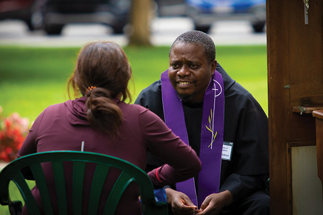 Vision 2024 Francois Serrano 5 Religious life: The call continues Friar Andrew Mukosa, O.F.M.Conv. of Zambia, who offers mission appeals in the summer, lends a listening ear to a pilgrim visiting the Basilica and National Shrine of Our Lady of Consolation in Carey, Ohio.