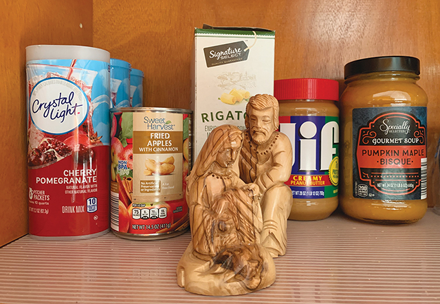 Vision 2024 Spotlight 11 Religious communities have deep and diverse roots A pantry shelf sports a carving of the holy family as a reminder to pray for those who lack food.