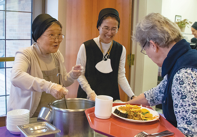 Vision 2024 Spotlight 8 Religious communities have deep and diverse roots Sisters belonging to the Korea Province of Sisters of Charity of Seton Hill serve Korean food during a Lunar New Year celebration at the community’s motherhouse in Greensburg, Pennsylvania.