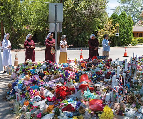 Vision 2024 McCulloh 2 Sisters help Uvalde move from trauma to trust Sisters stand in prayer in front of the flowers and other tributes piled up in the Robb Elementary schoolyard.