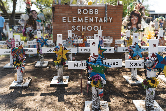 Vision 2024 McCulloh 3 isters help Uvalde move from trauma to trust Robb Elementary school sign surrounded by grave markers