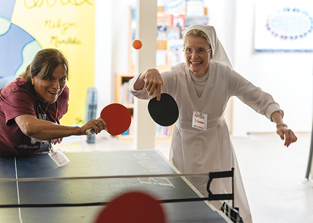 Vision 2024 McCulloh 7 Sisters help Uvalde move from trauma to trust Sister Suzanne Miller, F.M.A. and volunteer Susan Trevino join the children’s games with a rousing round of Ping-Pong.