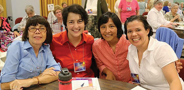 Vision 2024 Flansburg 4 Bringing sacred healing to hurting communities Sister Karina Conrad, second from left, with a group of her sisters at the annual assembly of the Sisters of Divine Providence.