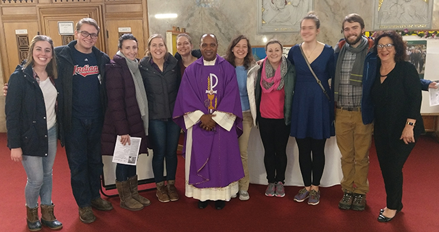 Vision 2024 Masterton 4 Man with a mission Munishi with Duquesne University students who visited his Baltimore parish to learn about and assist with the Spiritan ministry there.