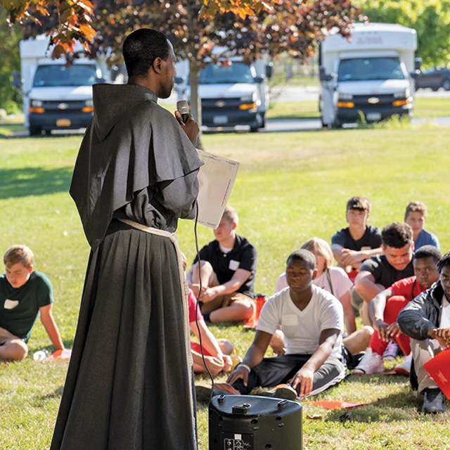Vision 2025 Grennan Gary 3 From physics lab to friary Brother Antonio Moualeu, O.F.M.Conv. leads a prayer meditation during a youth retreat.