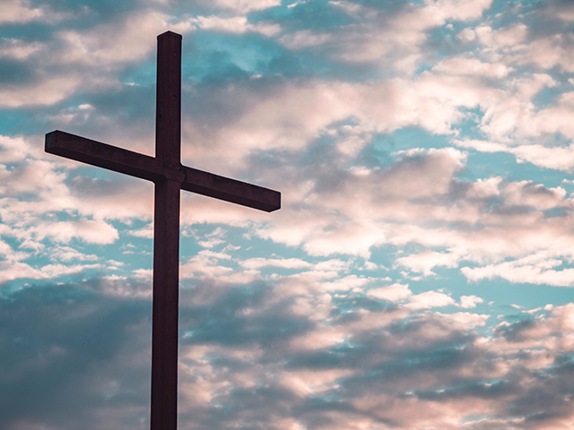 Vision 2025 Camille 4 Questions Catholics Ask cross against a beautiful sky